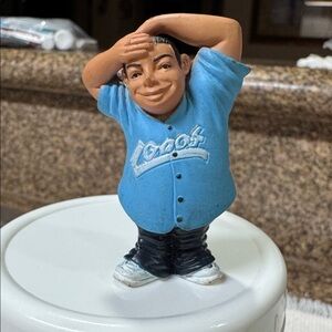 The product in the image is a "Pork Chop" figure from the Lil Locsters Series 1